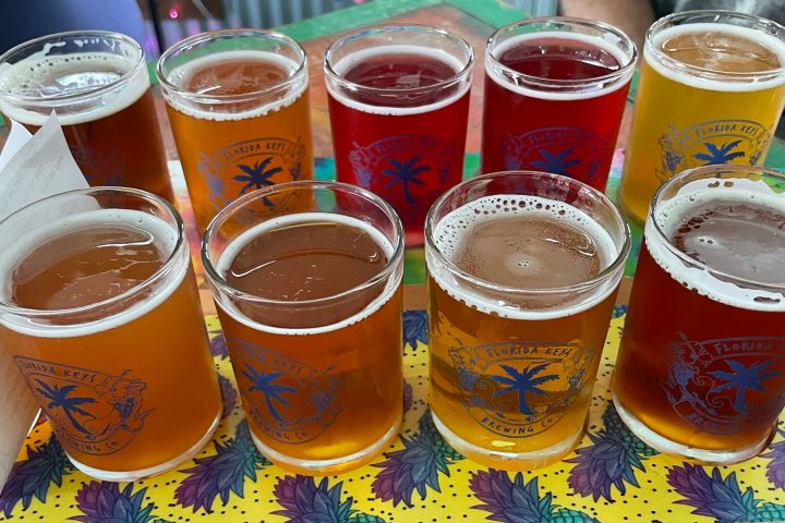 a cup of beer on a table